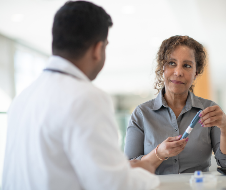 A Podiatrist consults with a patient who has diabetes